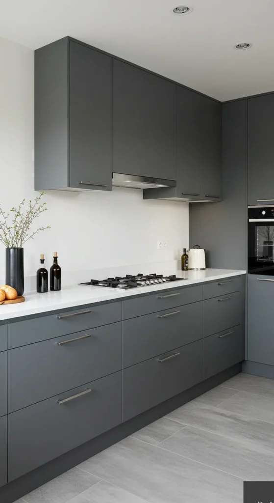 7 Beautiful Grey Kitchen Cabinet Paint Colors Slate grey cabinets in a sleek, minimal kitchen