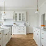 Stylish kitchen with multiple timeless white cabinet styles
