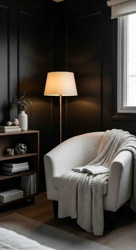 7 Black Bedroom Ideas For a Stunning Space Reading nook with armchair and soft lighting in black room
